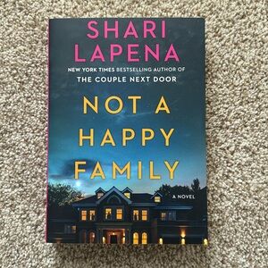 Paperback book: NOT A HAPPY FAMILY by Shari Lapena